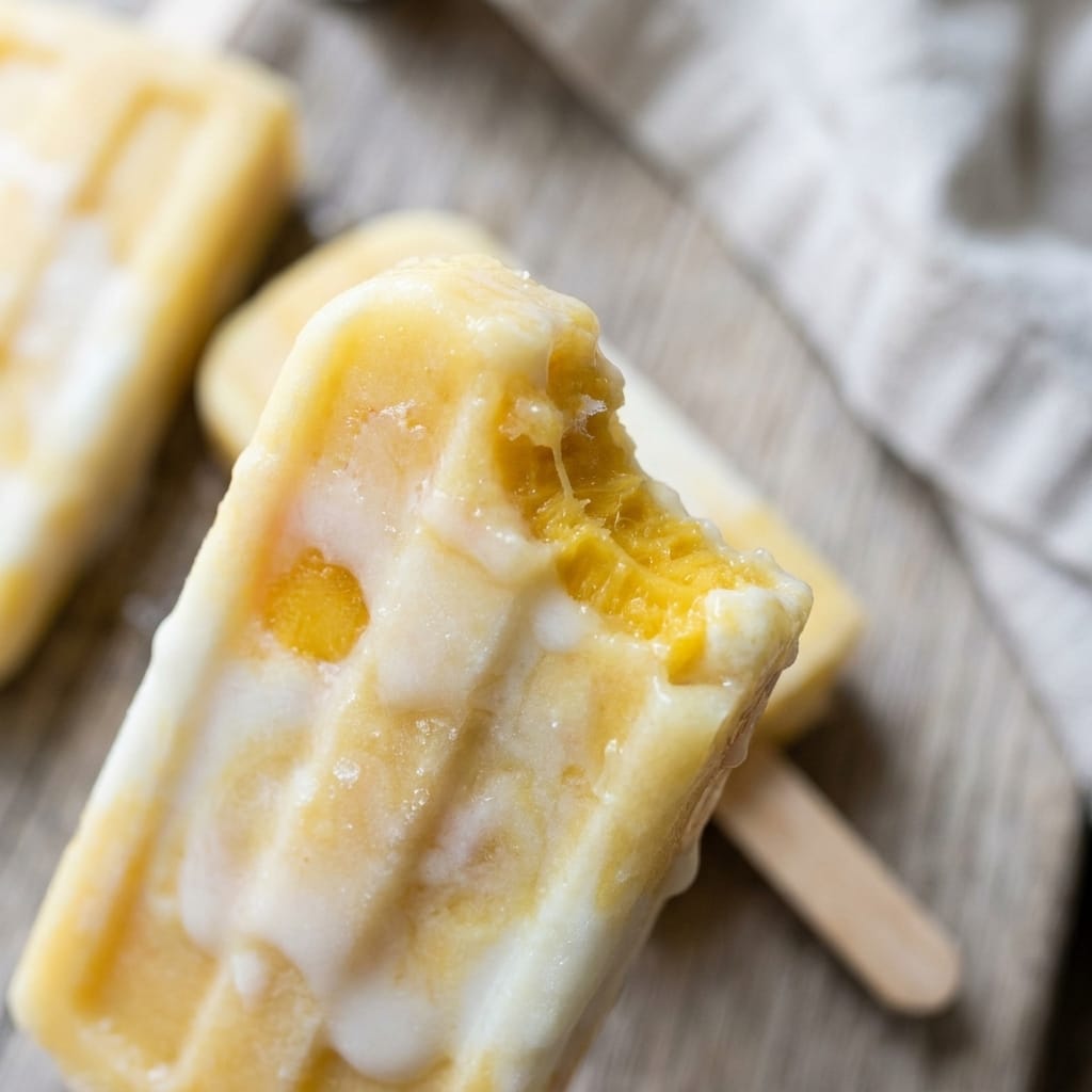 Frozen Mango Coconut Yogurt Popsicles